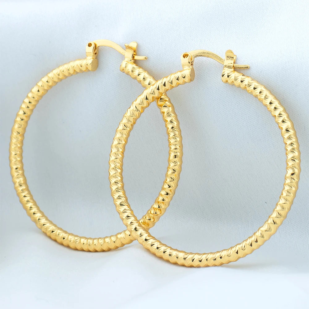 Shop stylish gold hoop earrings for women. Classic large circle copper earrings perfect for daily wear, parties, and special occasions. Fashionable and durable accessory.